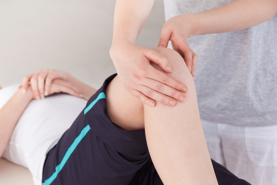 a person working with a physical therapist to manage osteoarthritis