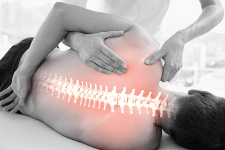 Person receiving physical therapy for their back.